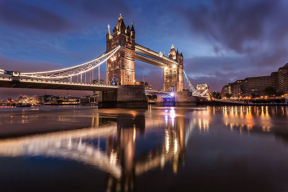 Tower Bridge lit up at dusk